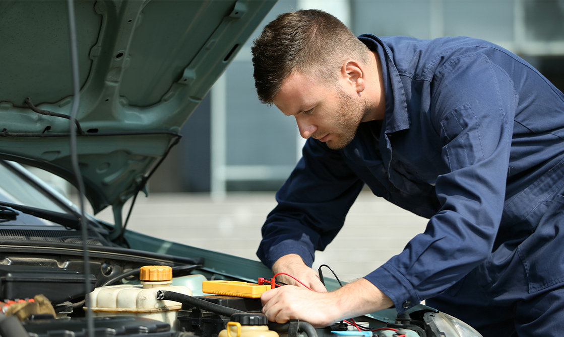 a man working on a car