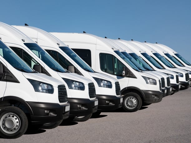 a row of white vans