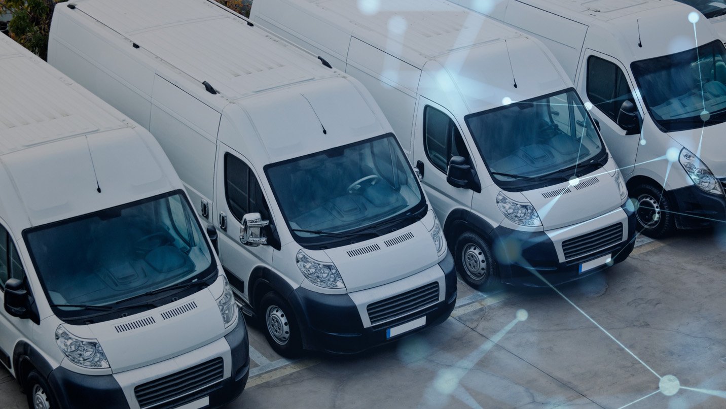 a group of white vans