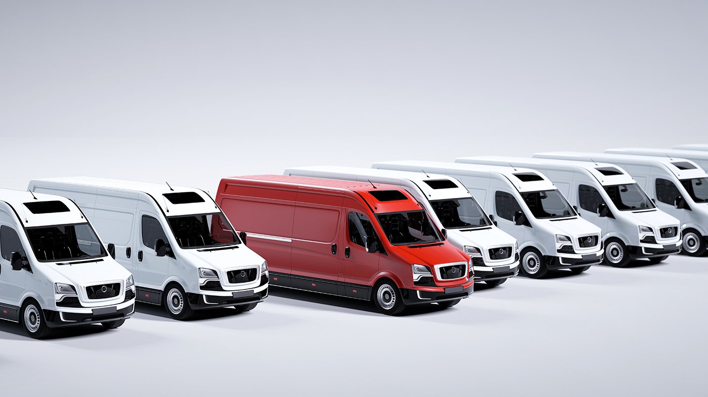 a group of white and red vans
