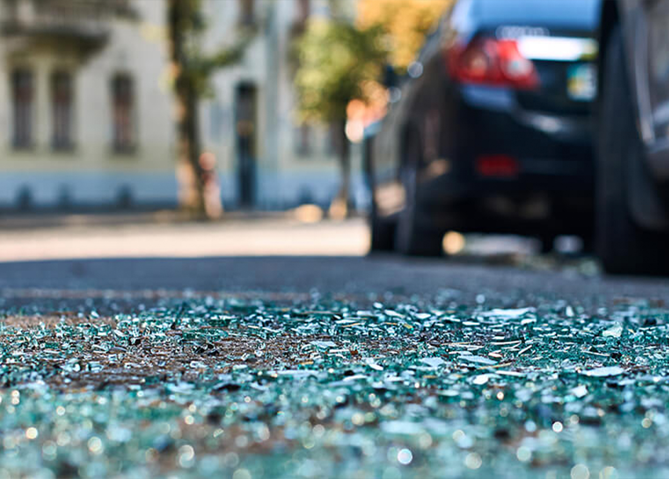 a broken glass on the ground
