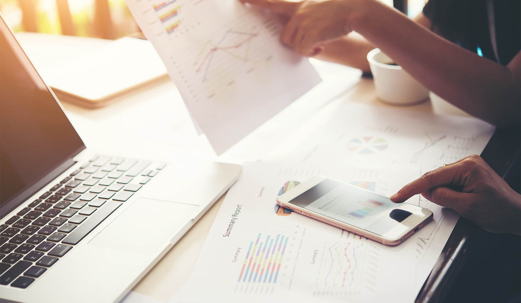 a person pointing at a paper