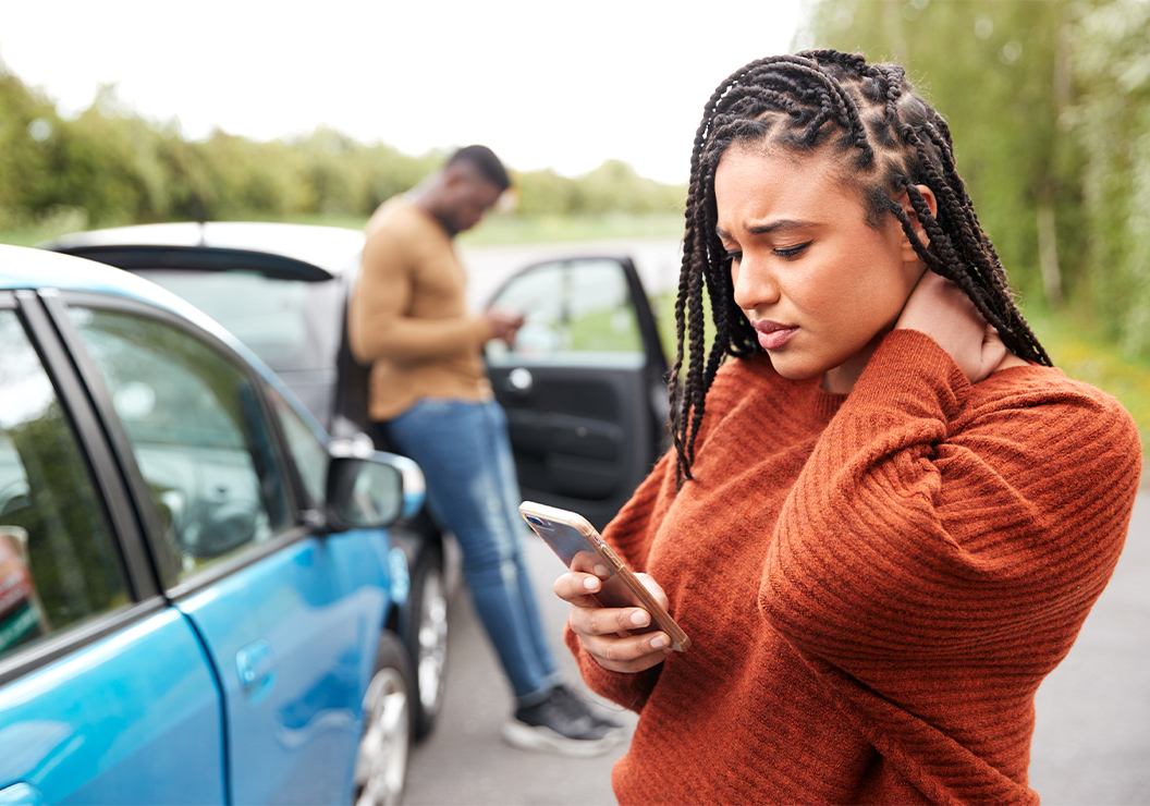 a woman looking at her phone
