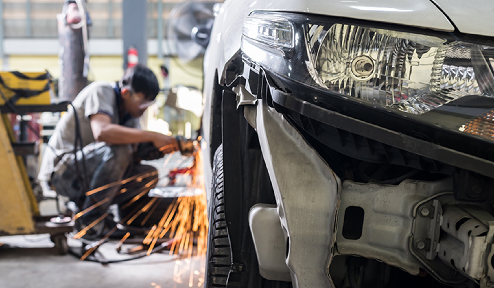 a man working on a car