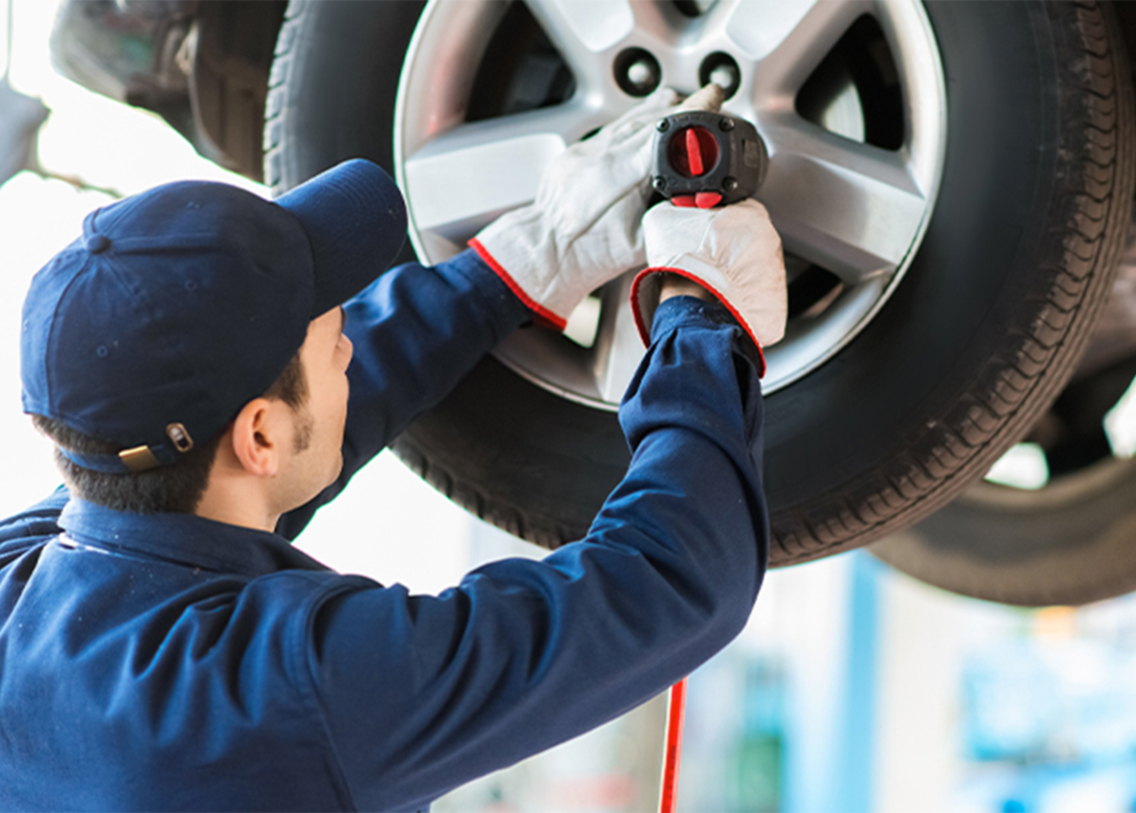 a man working on a tire
