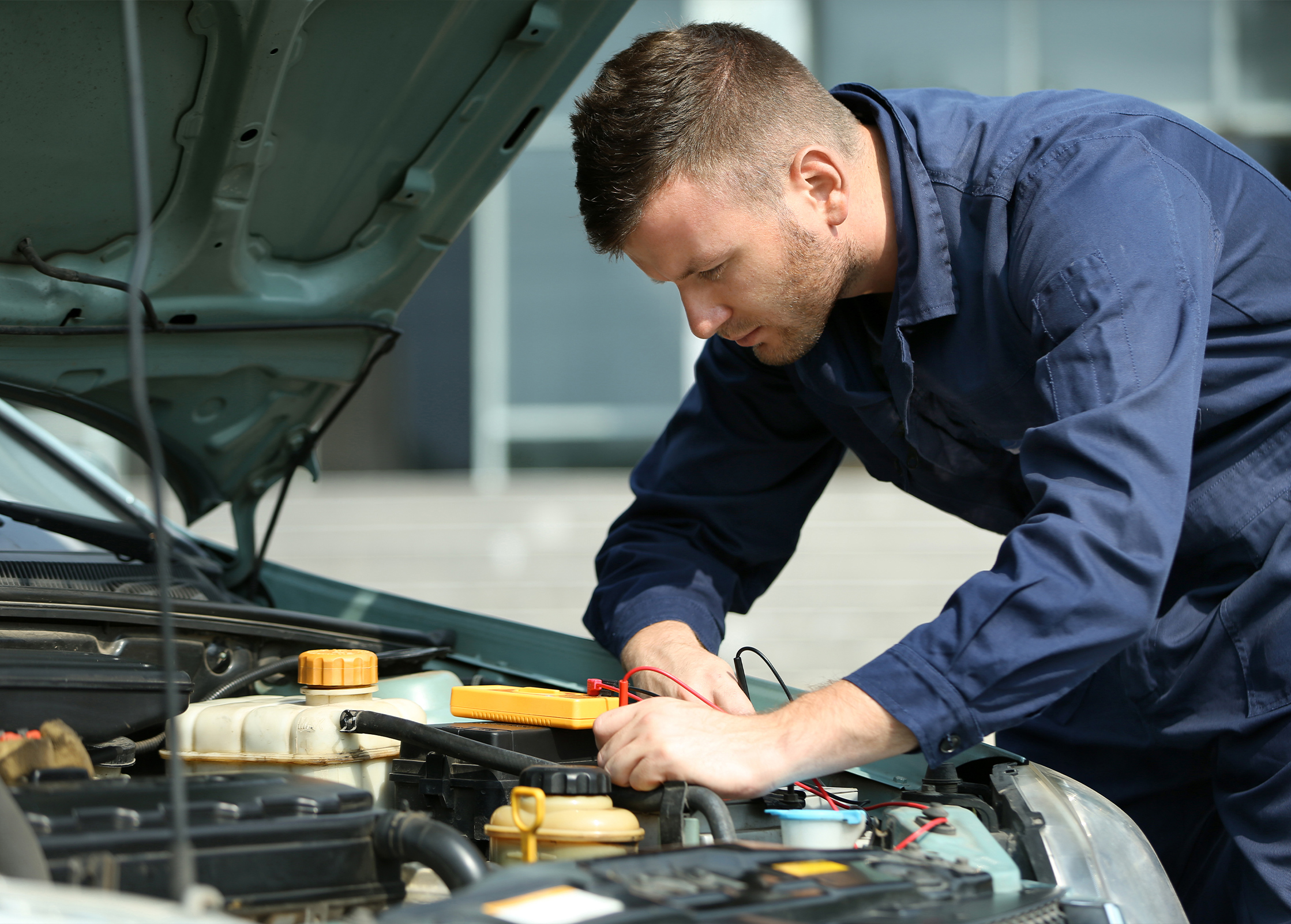 a man working on a car