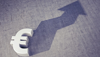 A euro with an increasing arrow as a shadow