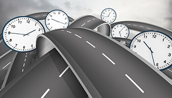 a road with clocks around it