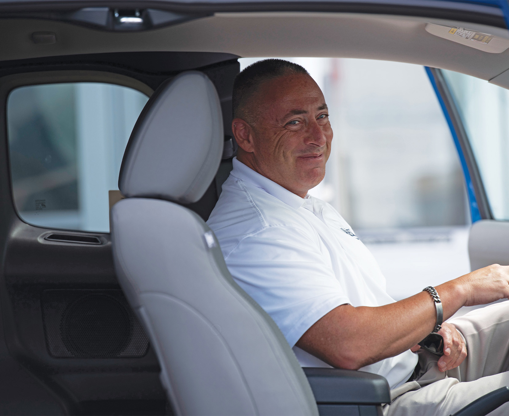 a man sitting in a car
