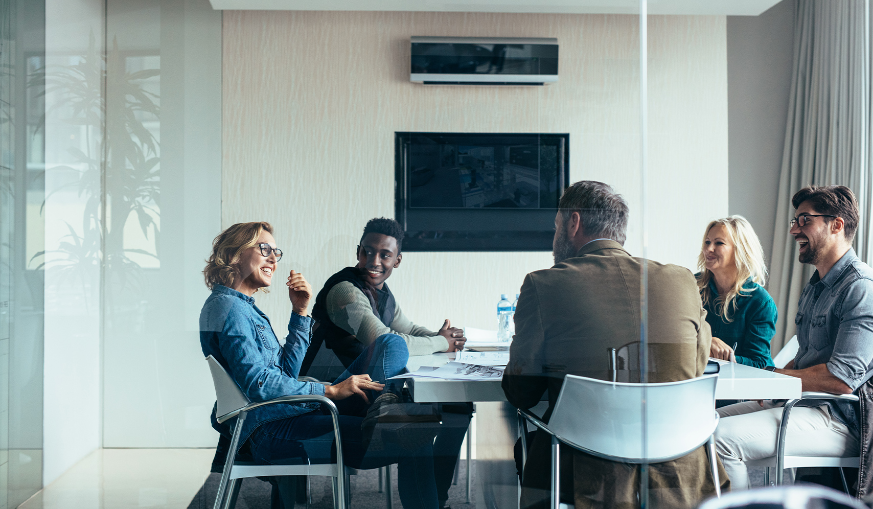 a group of people sitting at a table