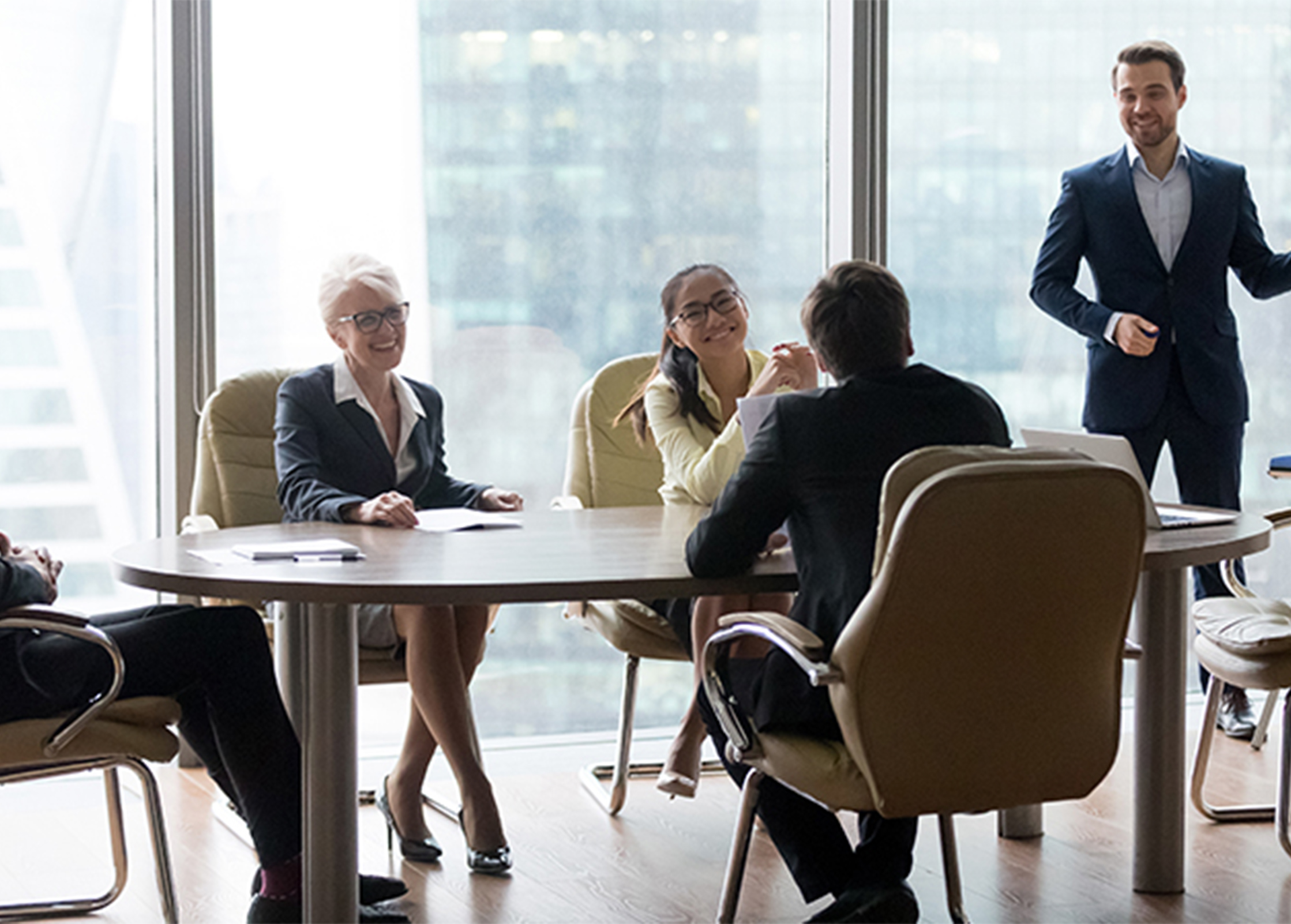 a group of people sitting at a table