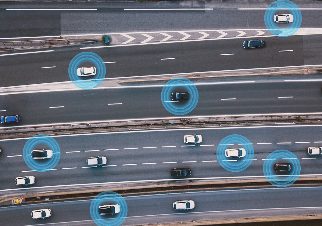 cars on a road with blue circles
