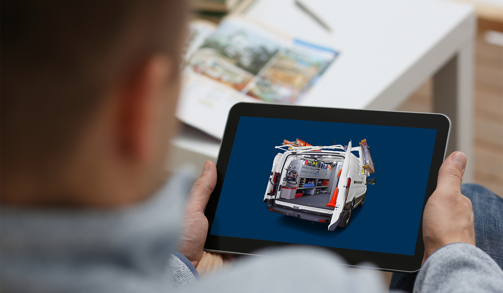 a person holding a tablet