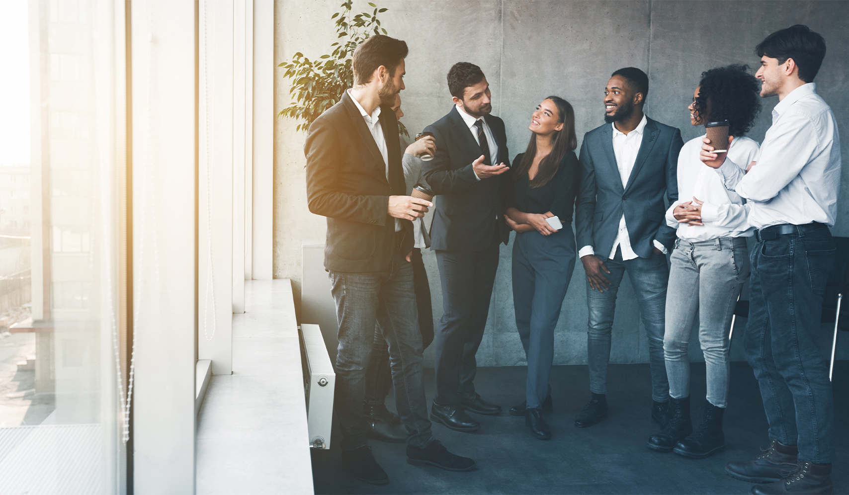 a group of people standing in a room