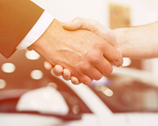 close-up of a handshake of a man and a woman