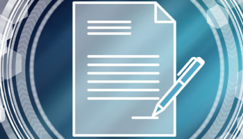 a close-up of a paper and a pen