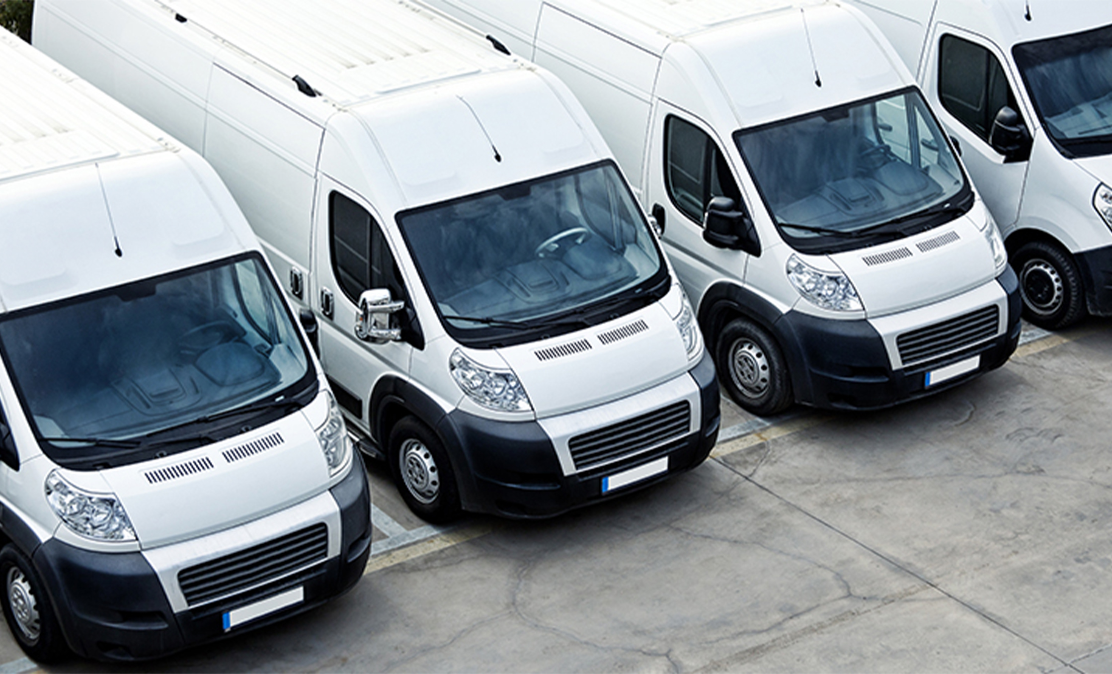 a row of white vans