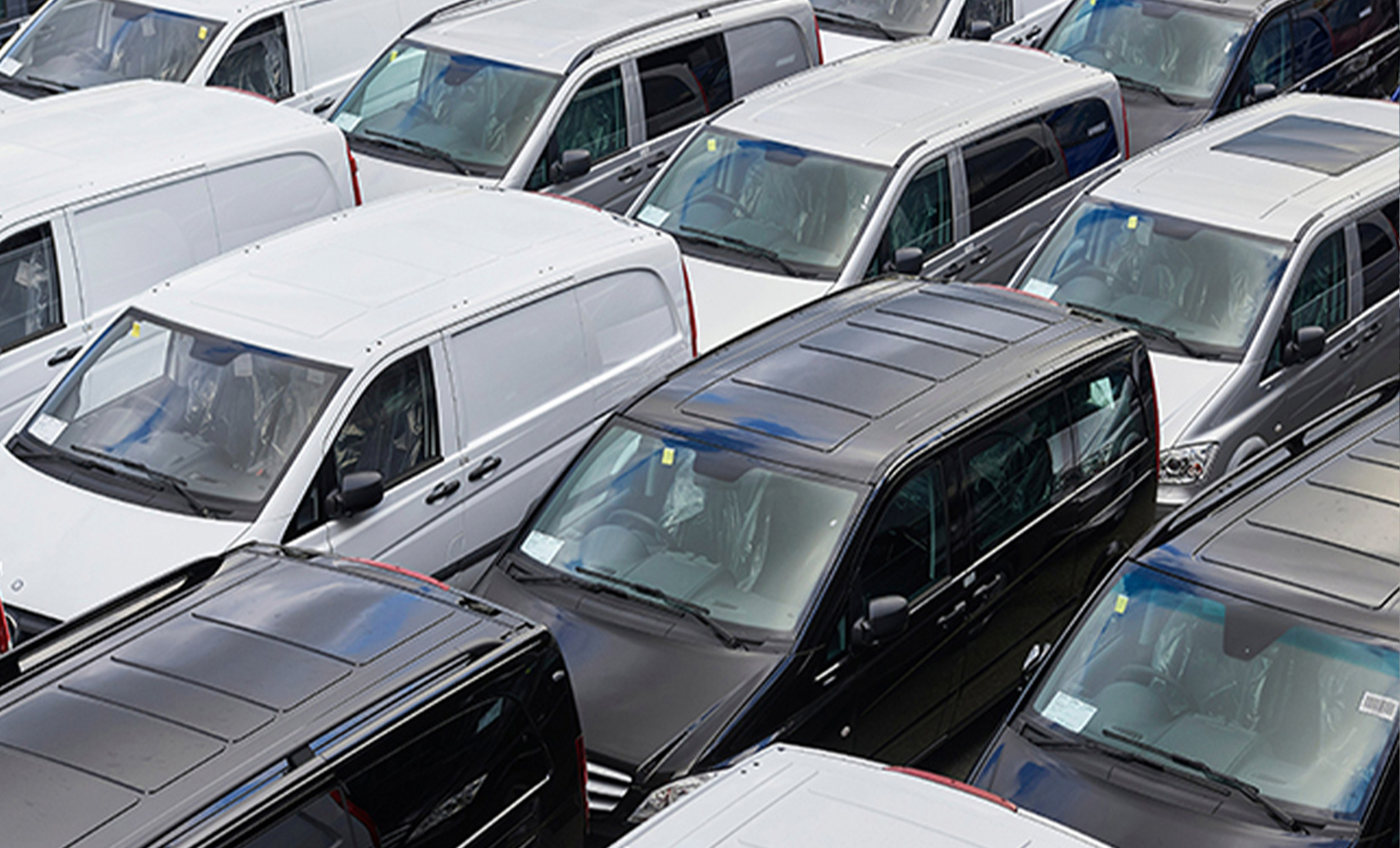 a group of cars in a parking lot