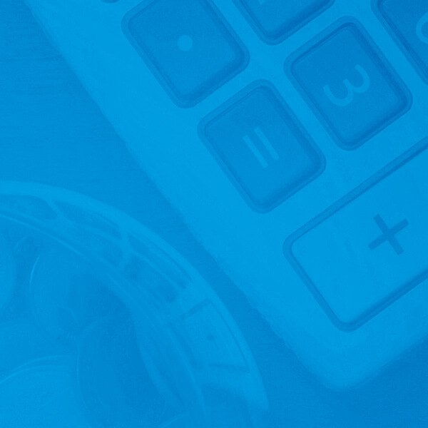 a calculator and a bowl of coins