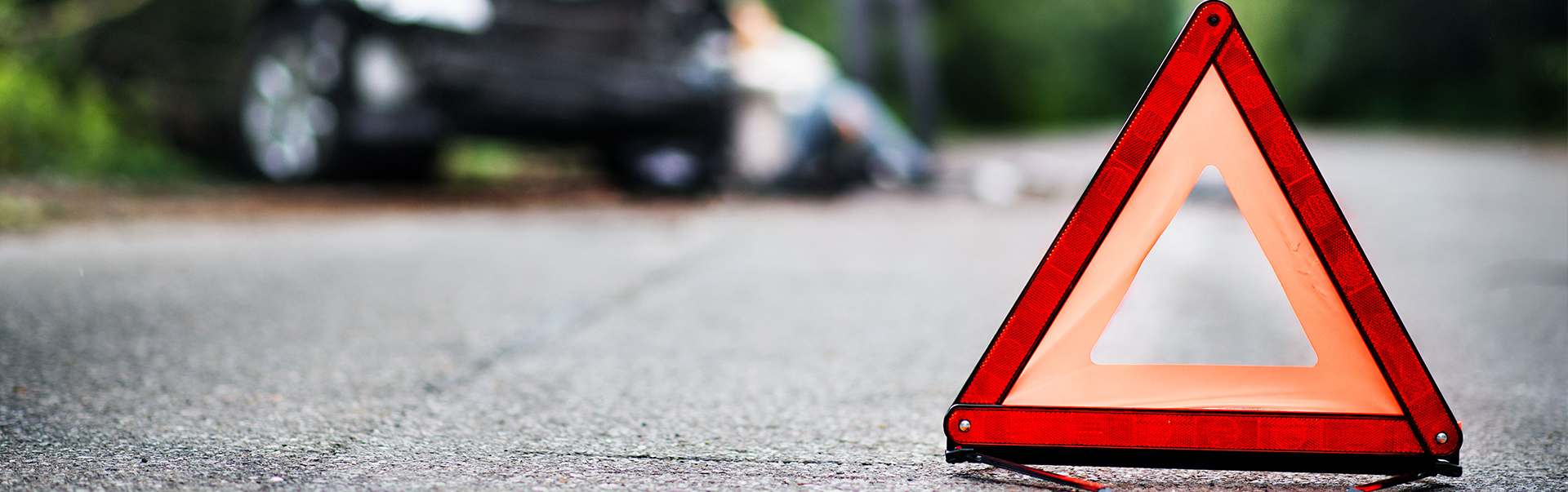 a close up of a triangle sign