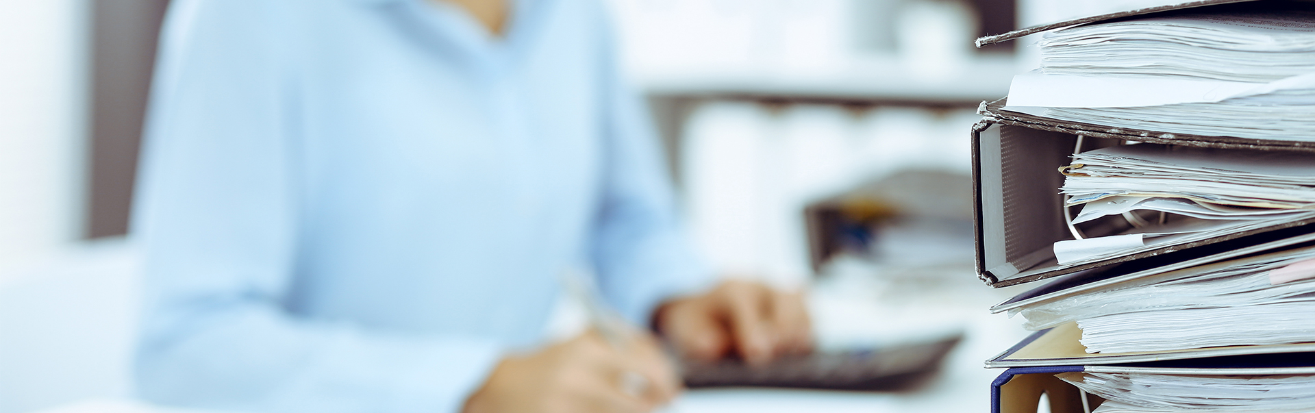 a blurry image of a person using a computer