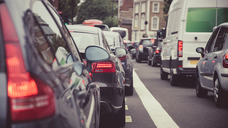 a group of cars on a street