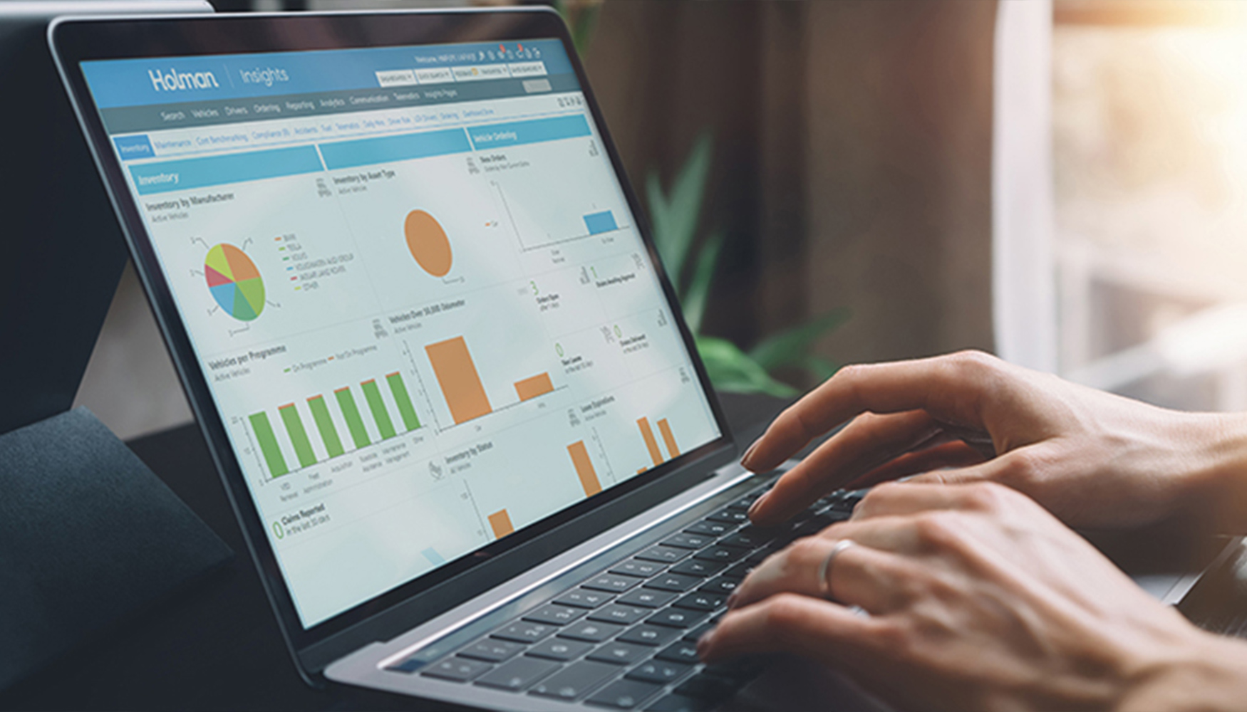 a person typing on a laptop