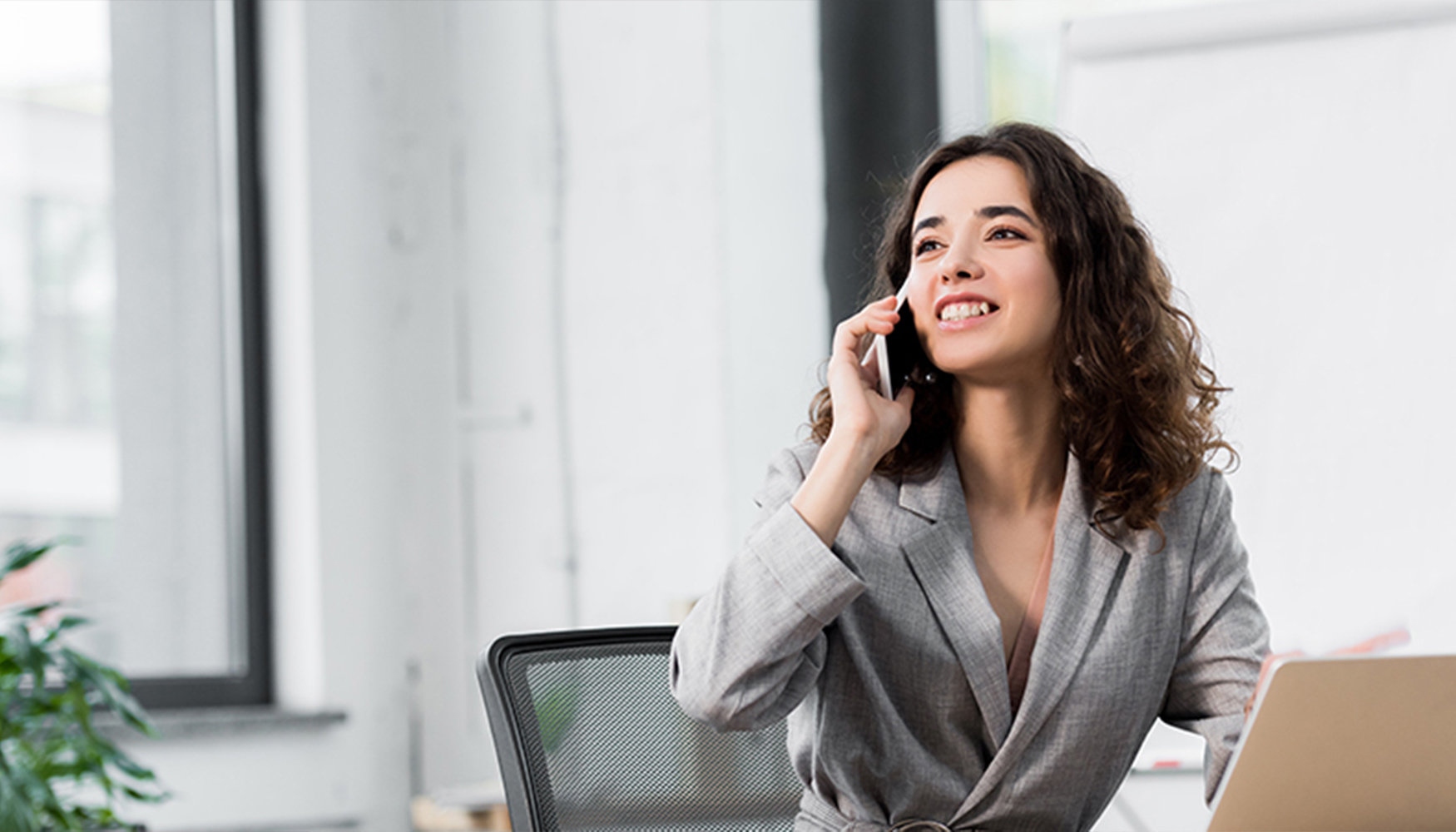 a woman talking on a cell phone