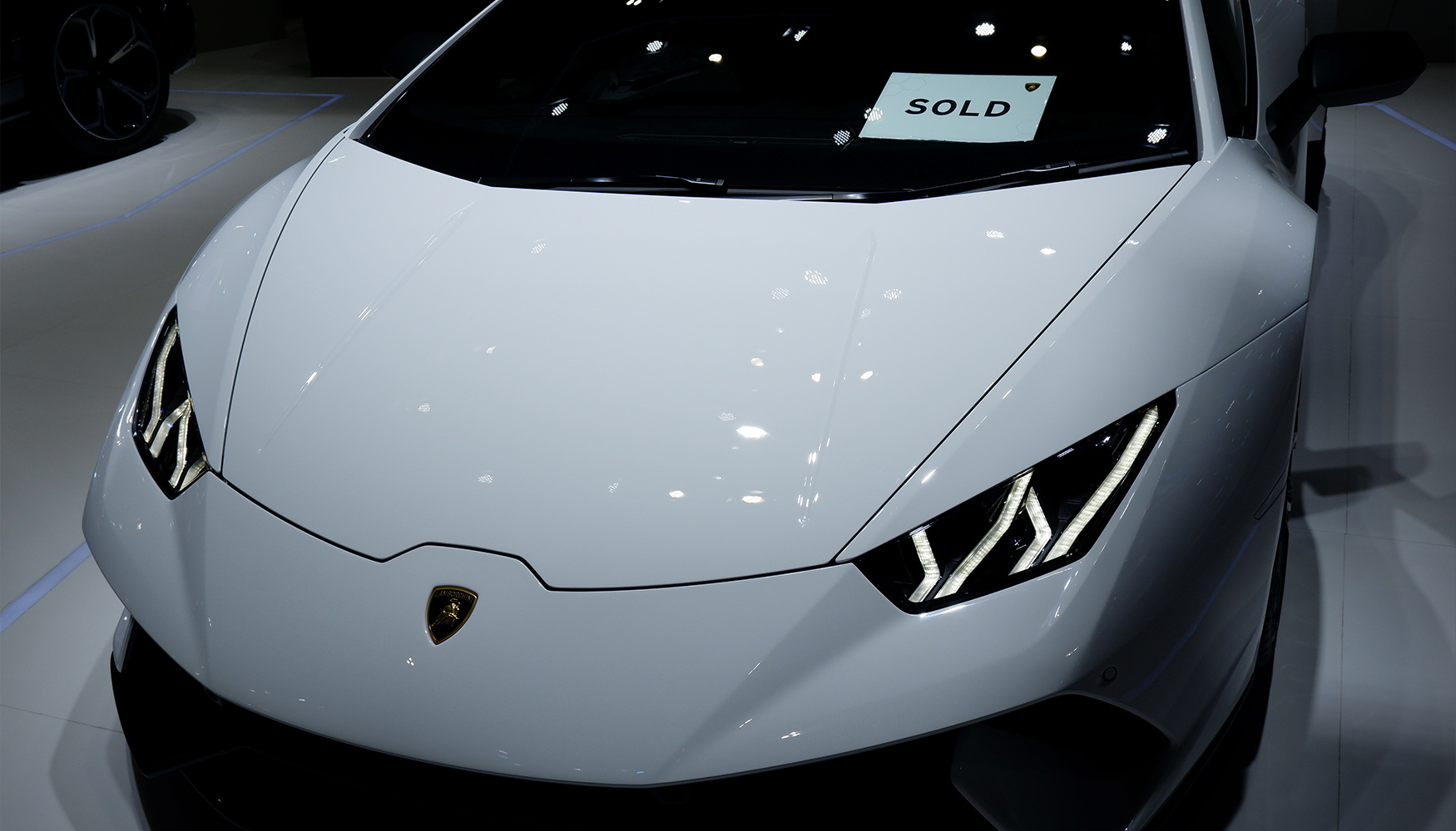 the front of a white sports car