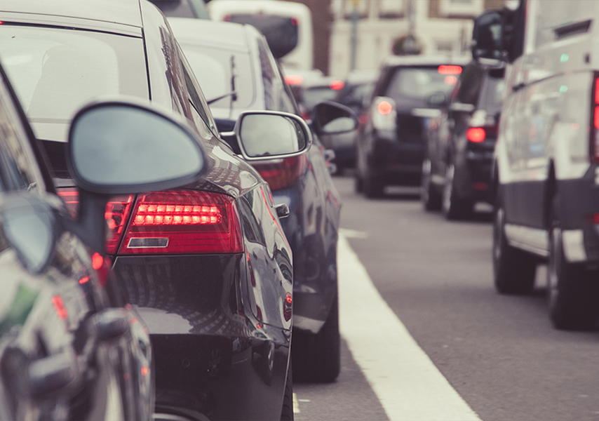 a group of cars on a street