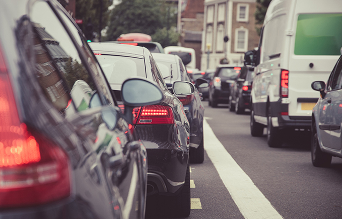 a group of cars on a street