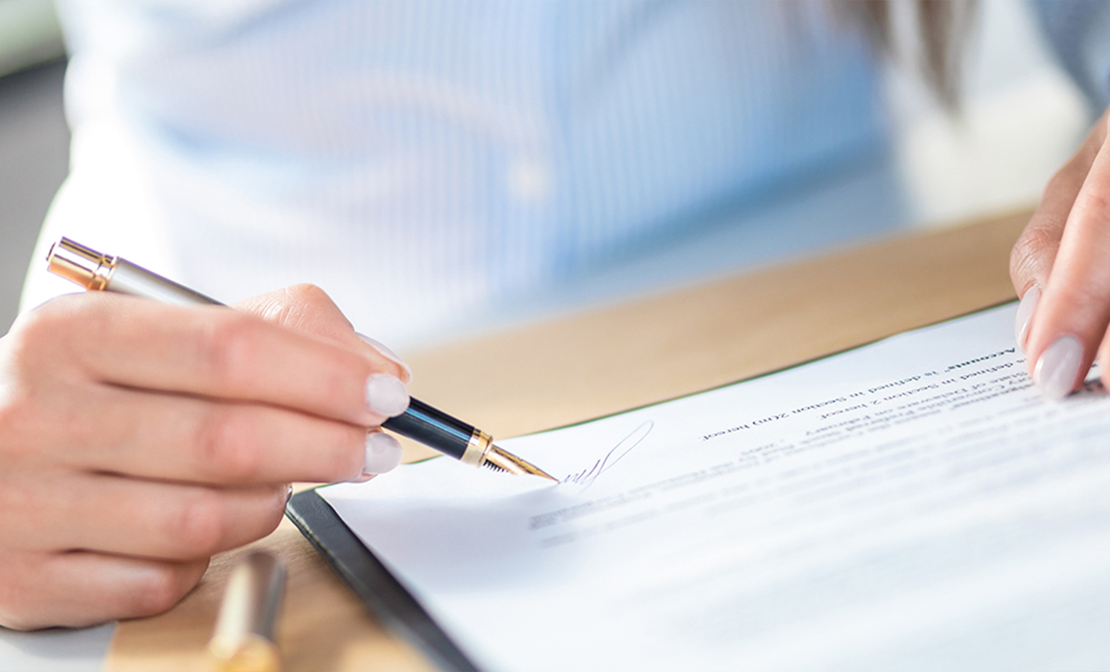 a person signing a document
