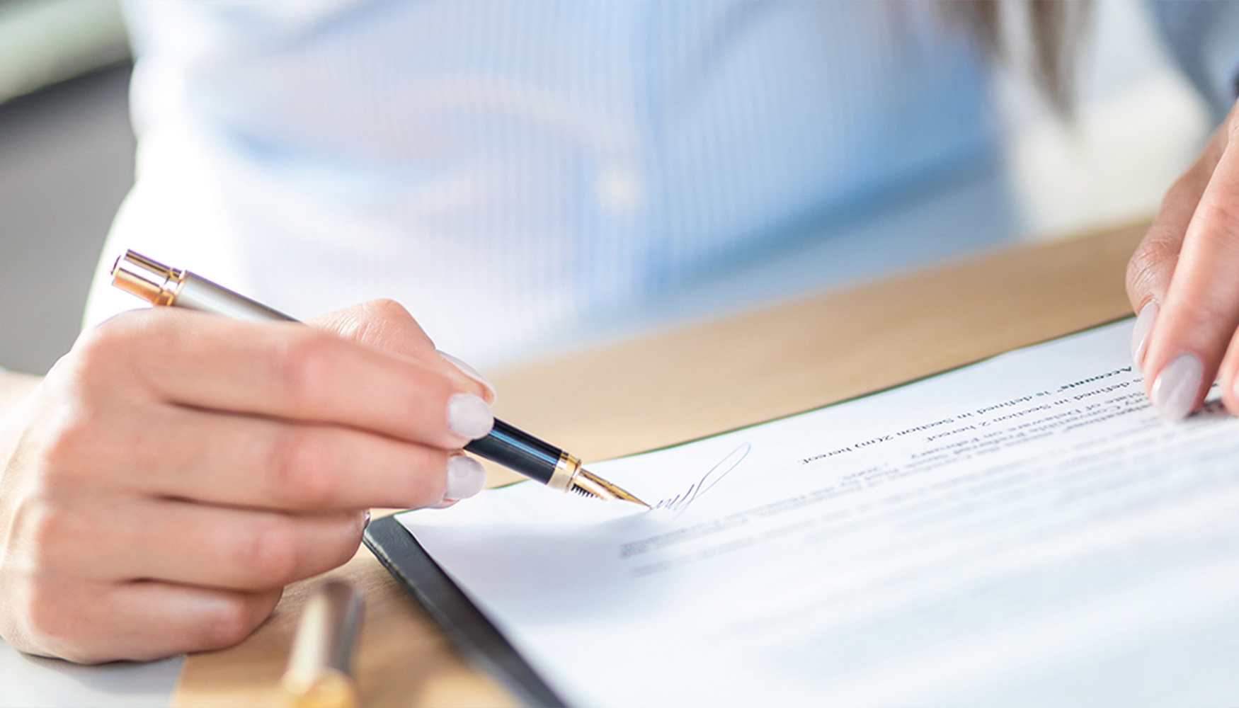 a person signing a document
