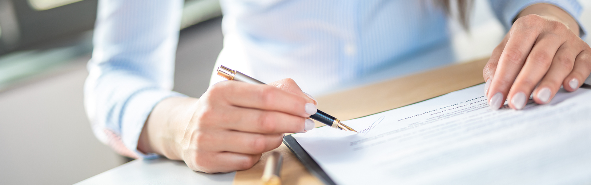 a person signing a document