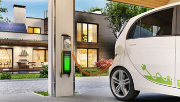 A vehicle being charged at a charging station