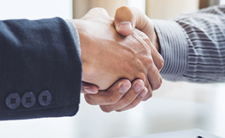 Two people shaking hands