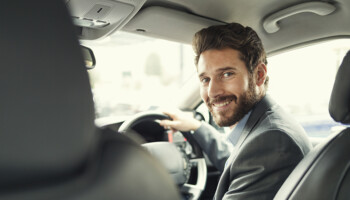 A man driving a vehicle