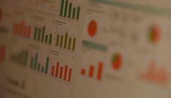 A screen with data charts on it