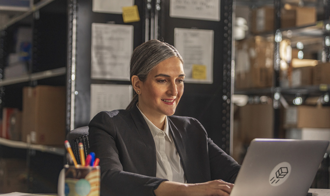 A woman working on a laptop