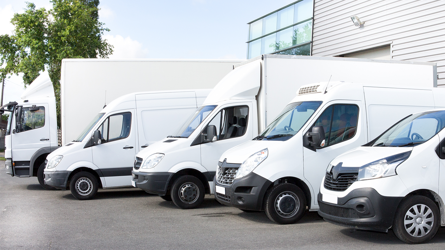 a row of white vans