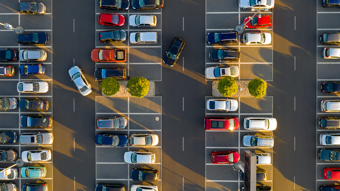 a parking lot with many cars