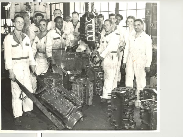 Black and white photo of the Holman team