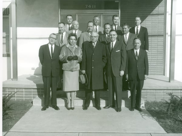 Black and white picture of people standing