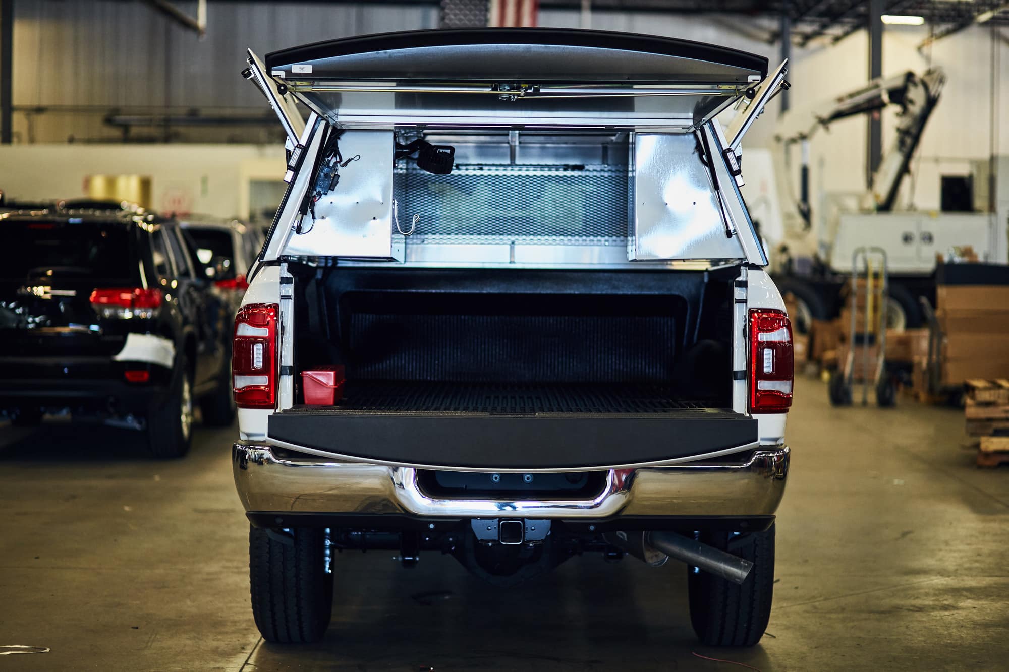 the back of a truck with the trunk open