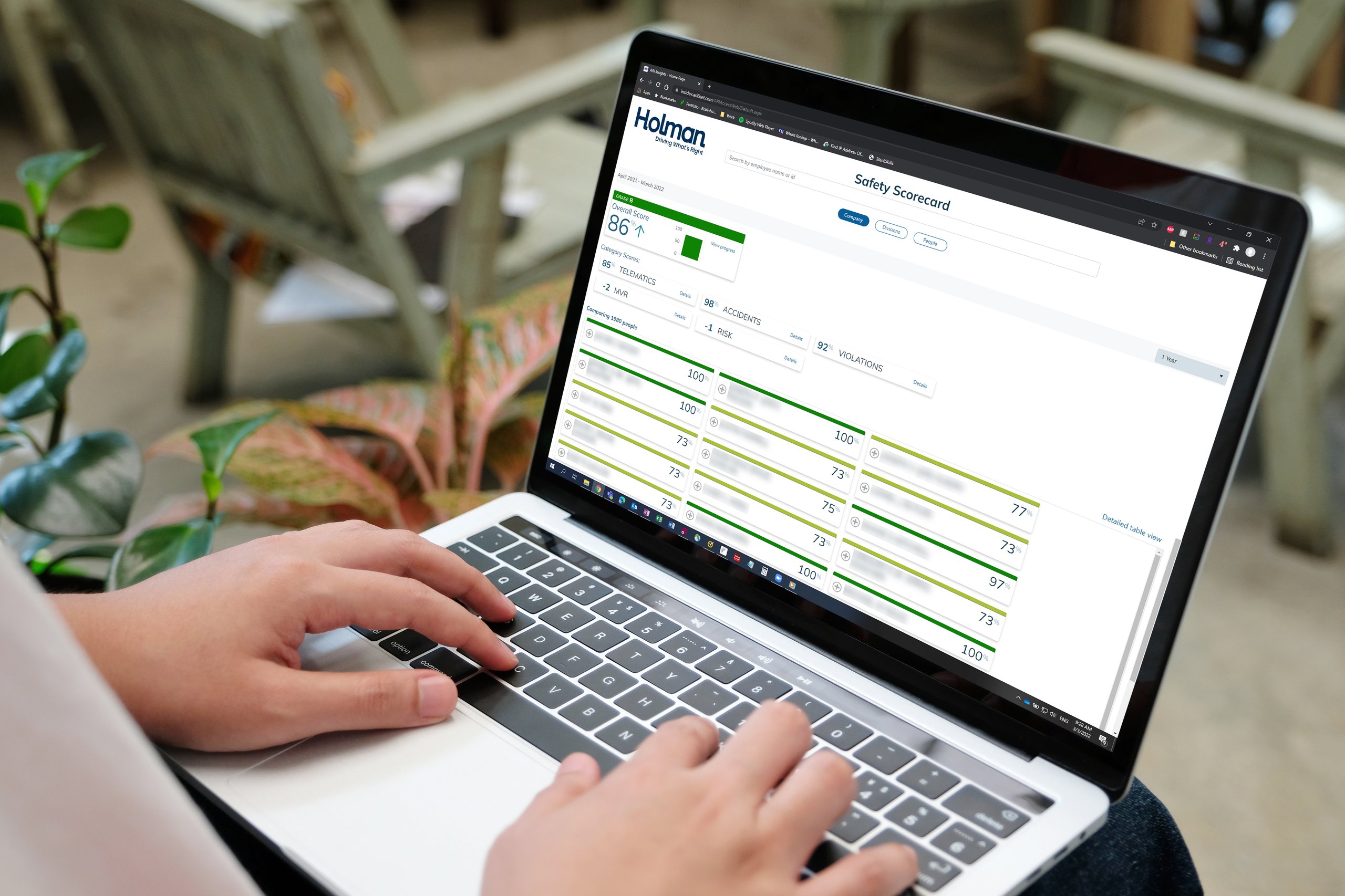 a person typing on a laptop