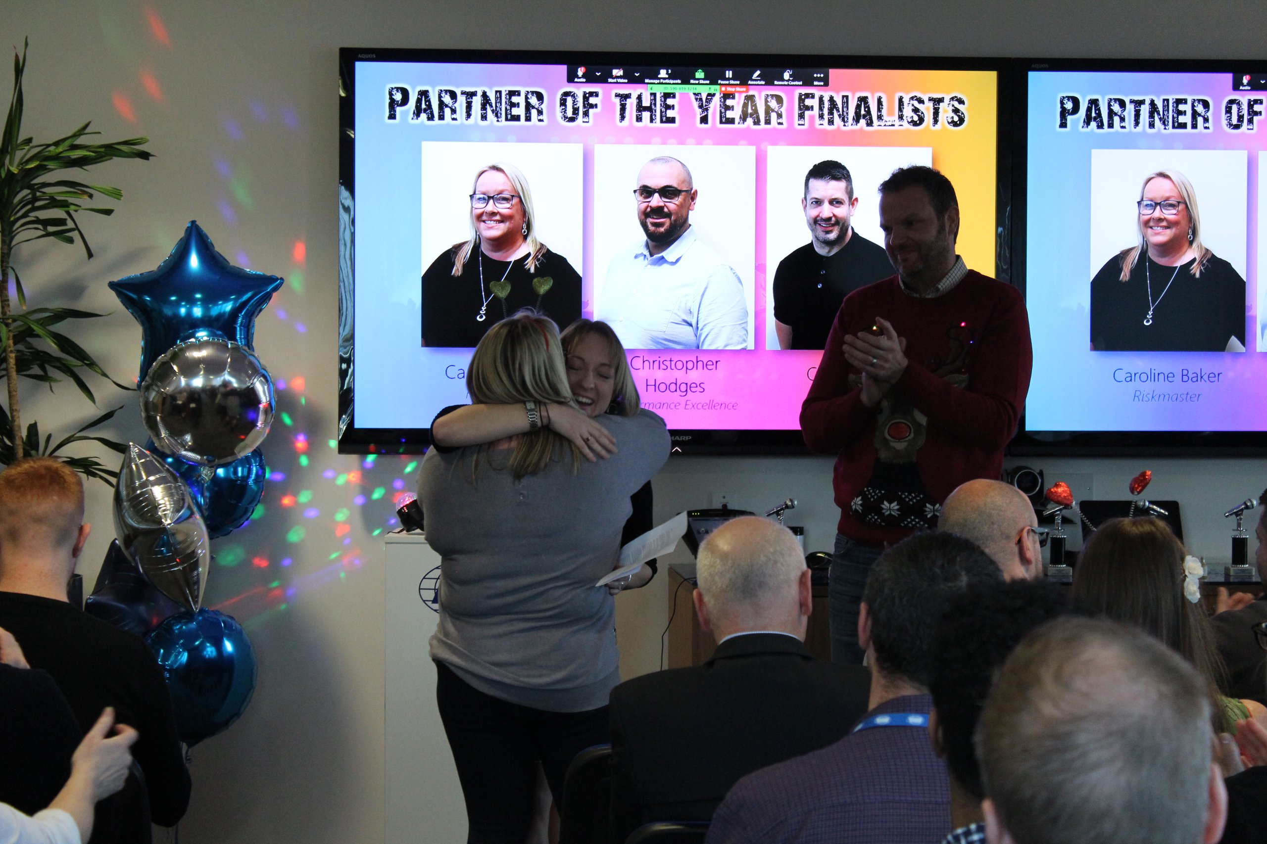 People congratulating their partner of the year