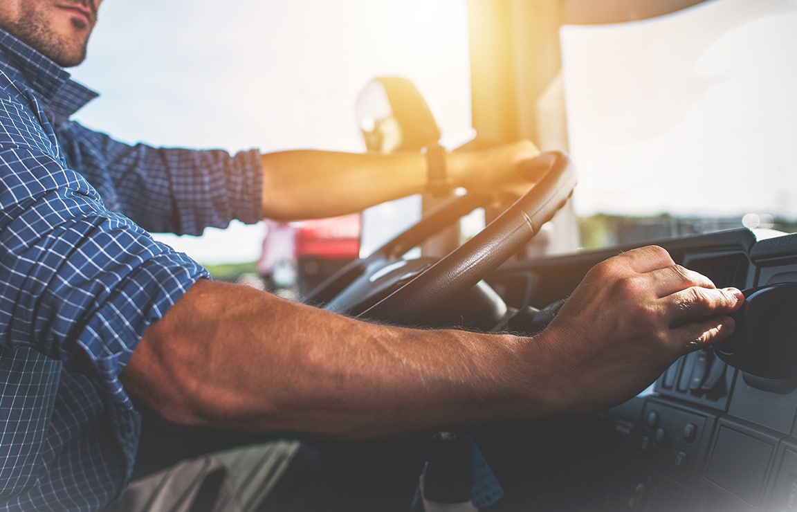 a man driving a vehicle