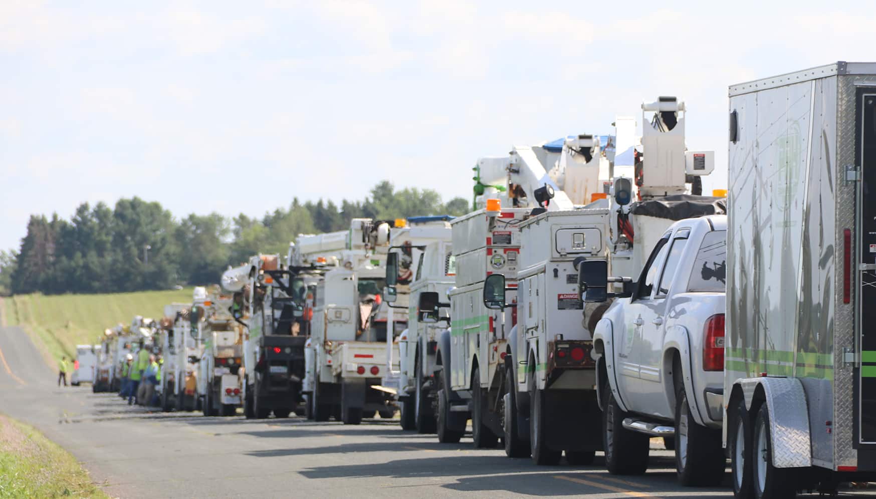 a row of white trucks
