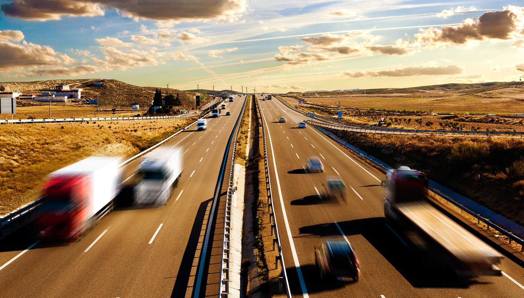 a highway with cars on it