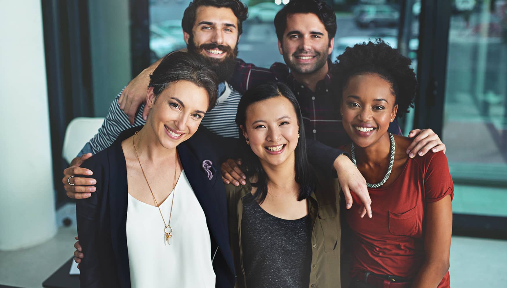 a group of people posing for a photo